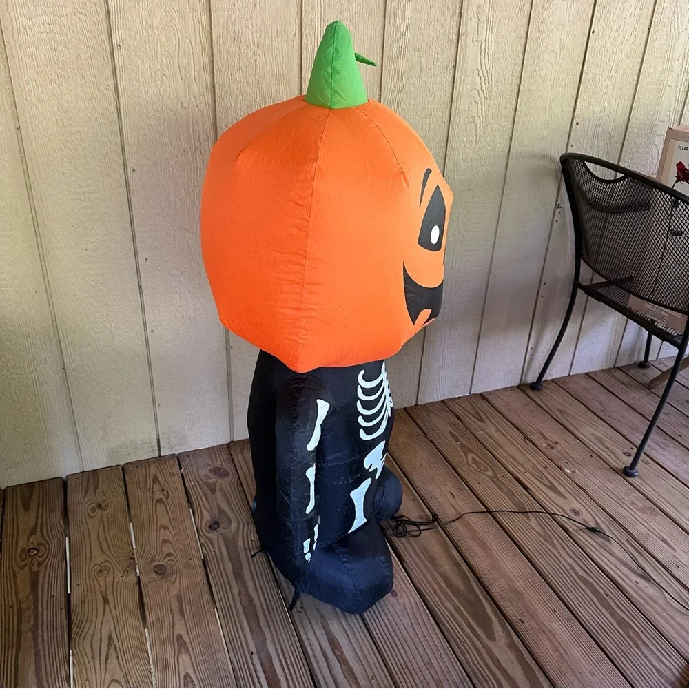 Home Accents Holiday 3.5 ft. Pre-lit Inflatable Happy Pumpkin Boy Skeleton LED